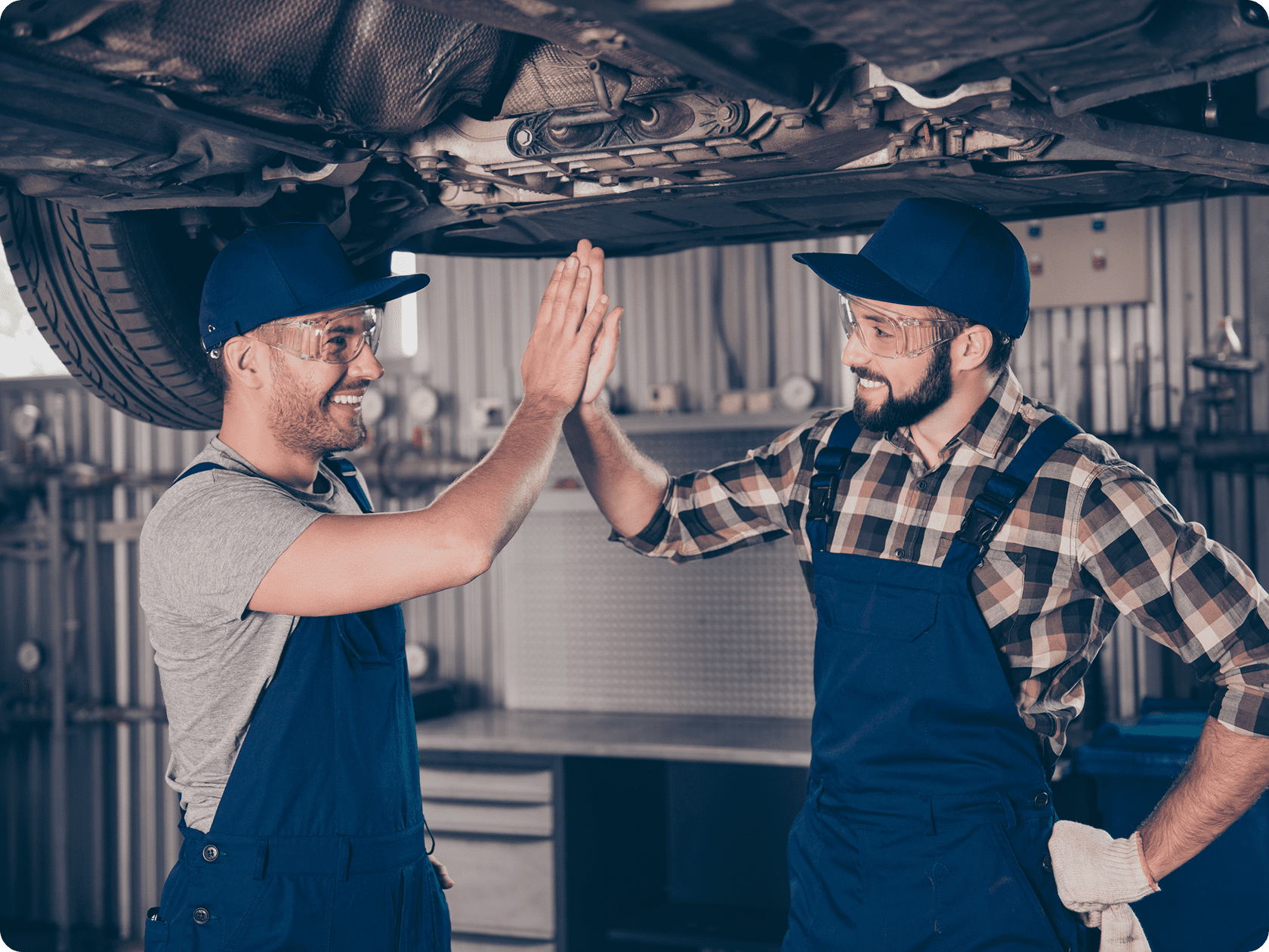 Auto technicians giving a high five