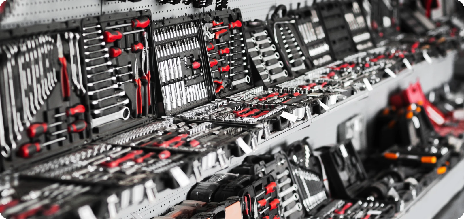 Professional tool sets arranged in rows.